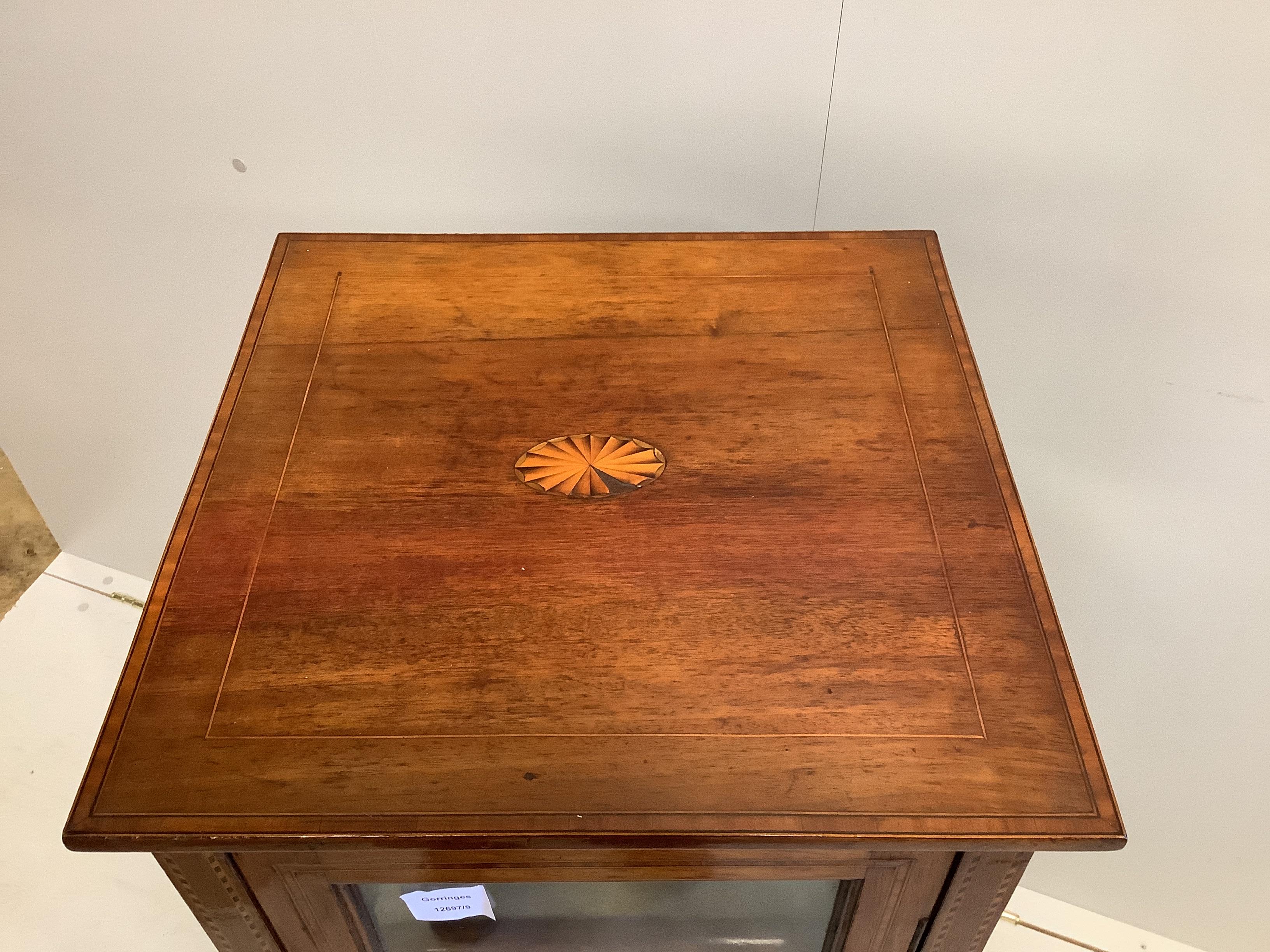 An Edwardian inlaid mahogany bijouterie cabinet, width 41cm, depth 40cm, height 110cm.